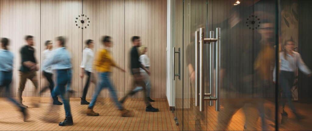 people walking in office