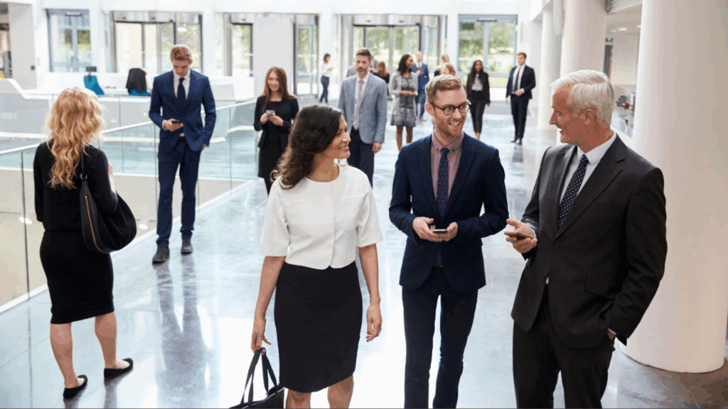 Office employees and senior leadership talking